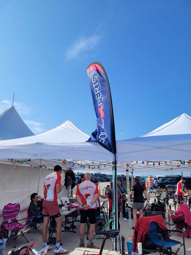 Solidxperts team tent at the 2024 Make-a-Wish 48-Hour Bike Ride event in Mirabel, Quebec.
